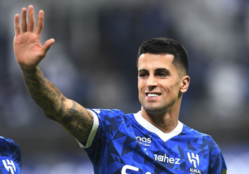 Soccer-Portugal's Cancelo returns to Barcelona on loan from Al-Hilal