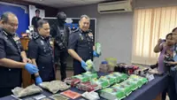 Drug ring busted in raid on JB terrace house