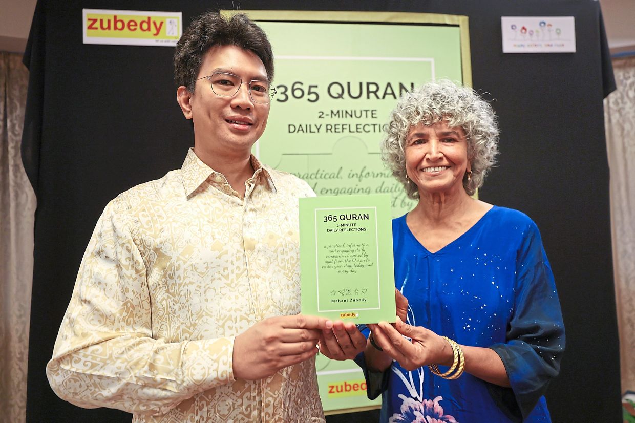 Tunku Zain with author Mahani Zubedy at the book launch of 365 Quran – 2-Minute Daily Reflections in Petaling Jaya, last December. — GLENN GUAN/The Star