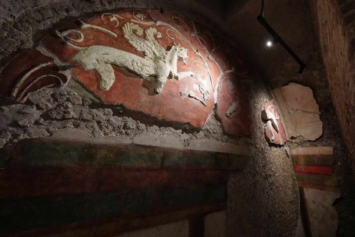 A detail of the griffins that decorate the newly-restored underground House of Griffins, dated between the II and I century B.C., on the Palatine Hill next to the Colosseum, is seen during a guided tour for the press, in Rome.