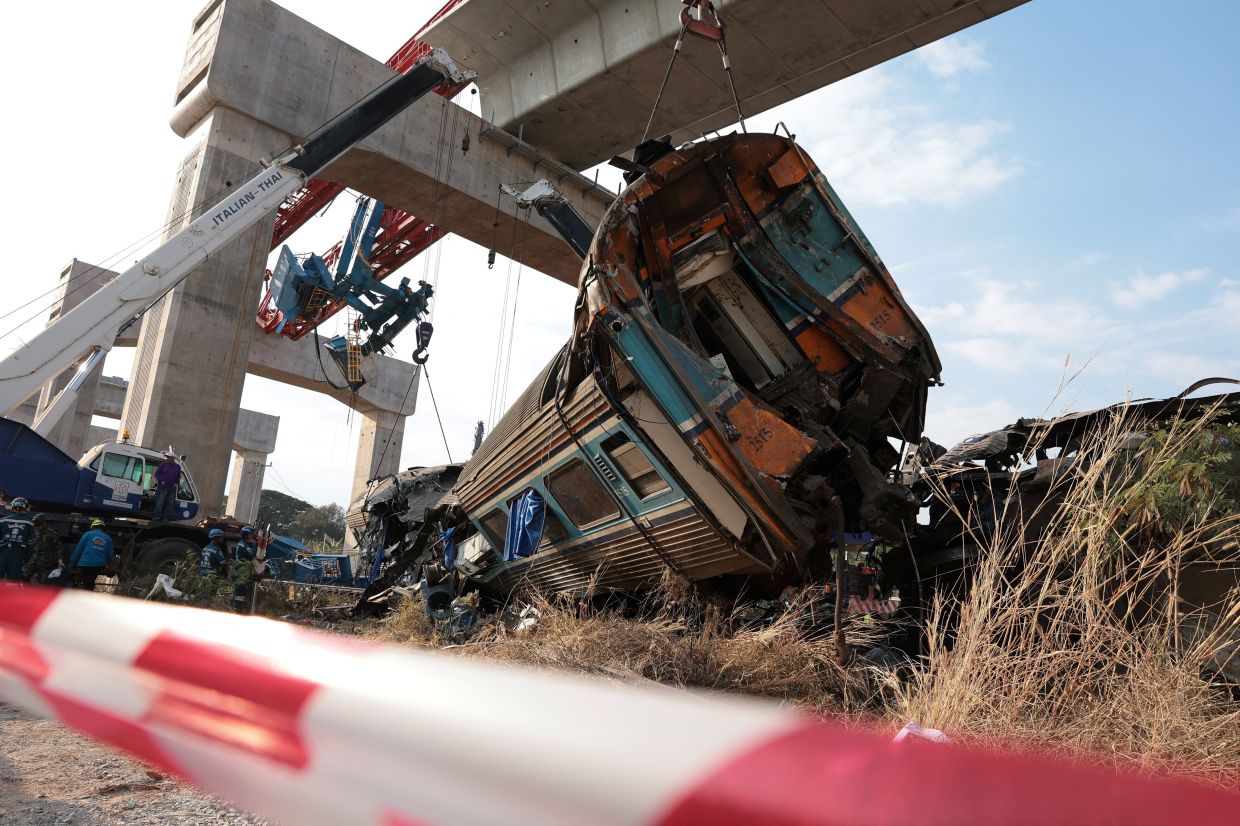 Wreckage at the site where a train was derailed when a construction crane collapsed and fell onto its carriages, causing several casualties, in Sikhio district, Nakhon Ratchasima province, Thailand, Jan 14, 2026. - Photo: Reuters