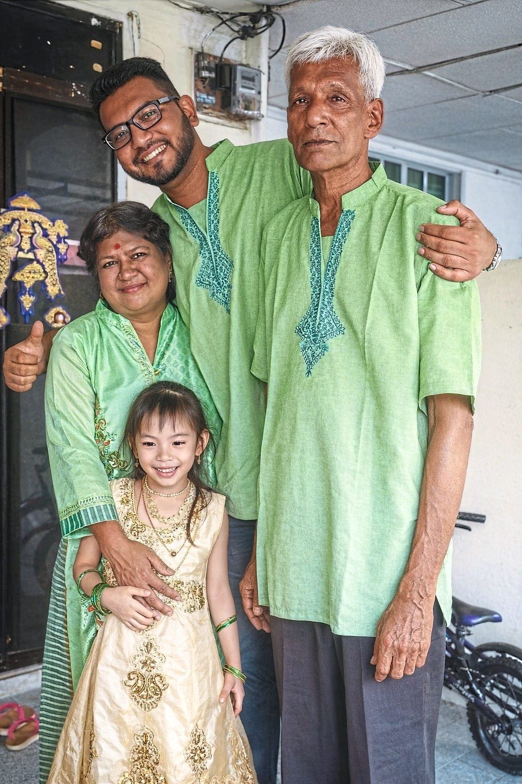 Dr Moventhiran (centre) remembers his parents, Ramakrishnan Kuppusamy (right) and Bangarama Subramaniam (left), whose perseverance and sacrifices fuelled his determination to succeed. Photo: Dr Moventhiran Ramakrishnan