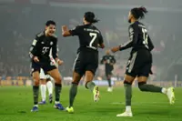 Soccer-Bayern beat Cologne 3-1 to set Bundesliga record at halfway mark