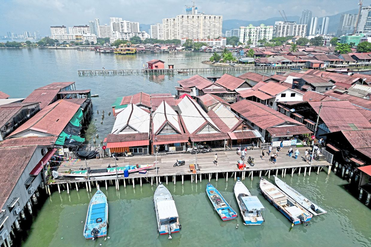 The Chew Jetty is one of the top tourist spots in George Town. — CHAN BOON KAI/The Star