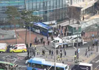Bus runs over pedestrians as it crashes into Seoul building, 13 injured