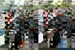 Fraudsters flee Cambodia's 'scam city' after accused boss taken down