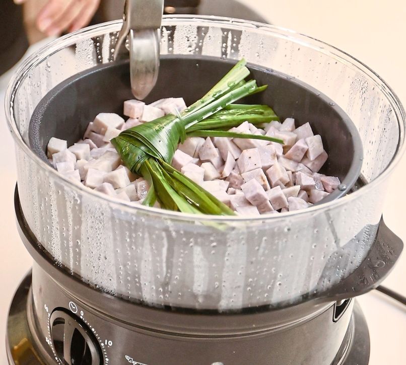 Separate the neat cubes of taro from the off-cuts and steam.