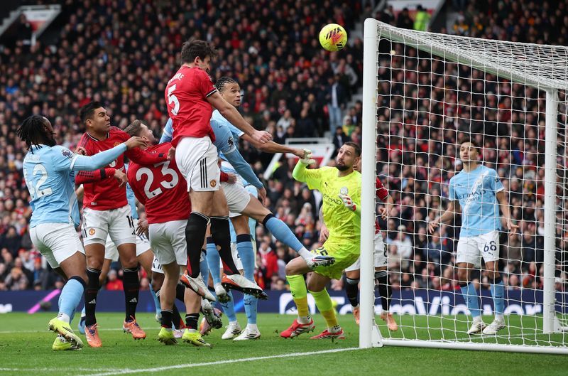 Soccer-Man Utd sweep past Man City as Carrick enjoys perfect start