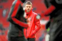 Carrick out to stop the slide