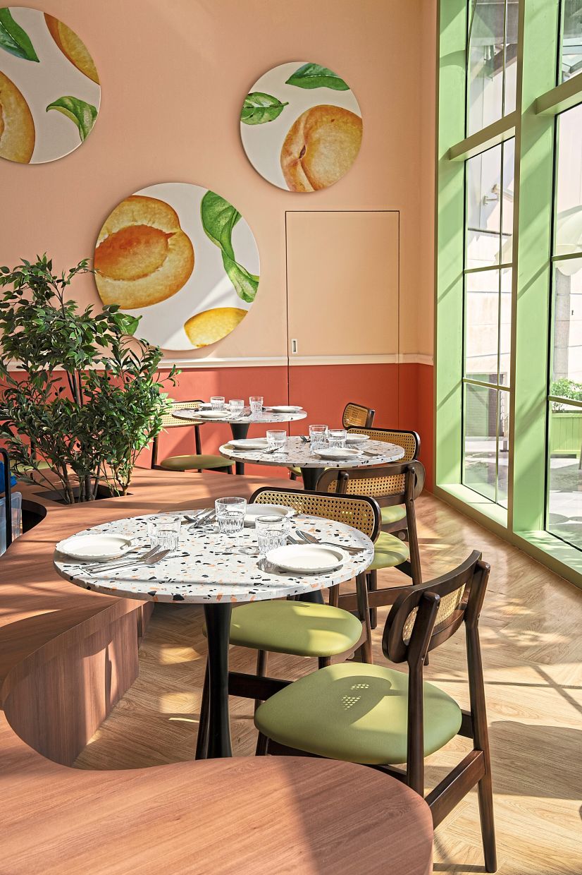 The restaurant has a charming outdoor area that allows for sunlight to stream in. — Apricot by Peaches and Cream