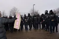 Whistles and walkie-talkies: Minneapolis keeps guard over schools amid ICE arrests