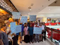 Kg Jalan Papan residents press DAP to deliver housing promises before GE16