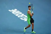 Tennis-Alcaraz swats aside Walton as career Grand Slam bid begins in Melbourne