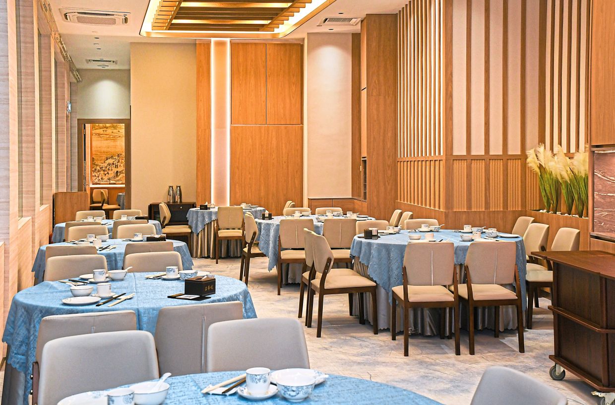 The contemporary dining spaces of San Xi Lou will bring a touch of class to your Chinese New Year reunion banquets. — Courtesy photo