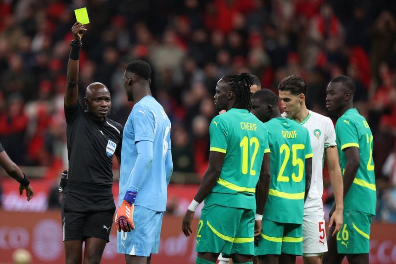 Soccer-Senegal stormed off in heat of the moment but football won, says keeper Mendy