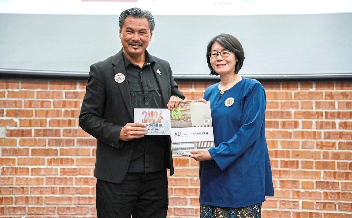 Adrianta (left) with Yong during the launch of SinggahKL 2026. Photo: PAM