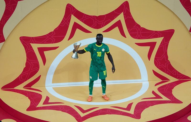 Soccer-Mane leaves Cup of Nations stage at the top