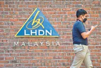Chinese workers slapped with RM1.5mil tax bills after employer fakes high salaries
