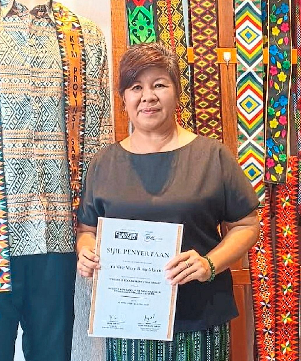 Mama JaRum participant Yahira says she now earns enough to support herself from sewing outfits with ethnic patterns.