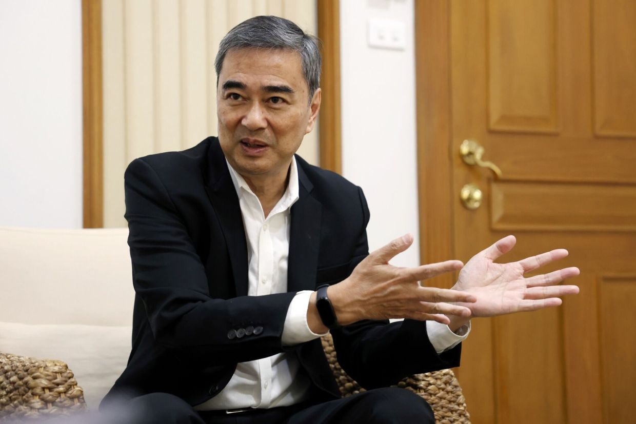 Thai ex-Premier Abhisit seeks return as anti-scammer kingmaker