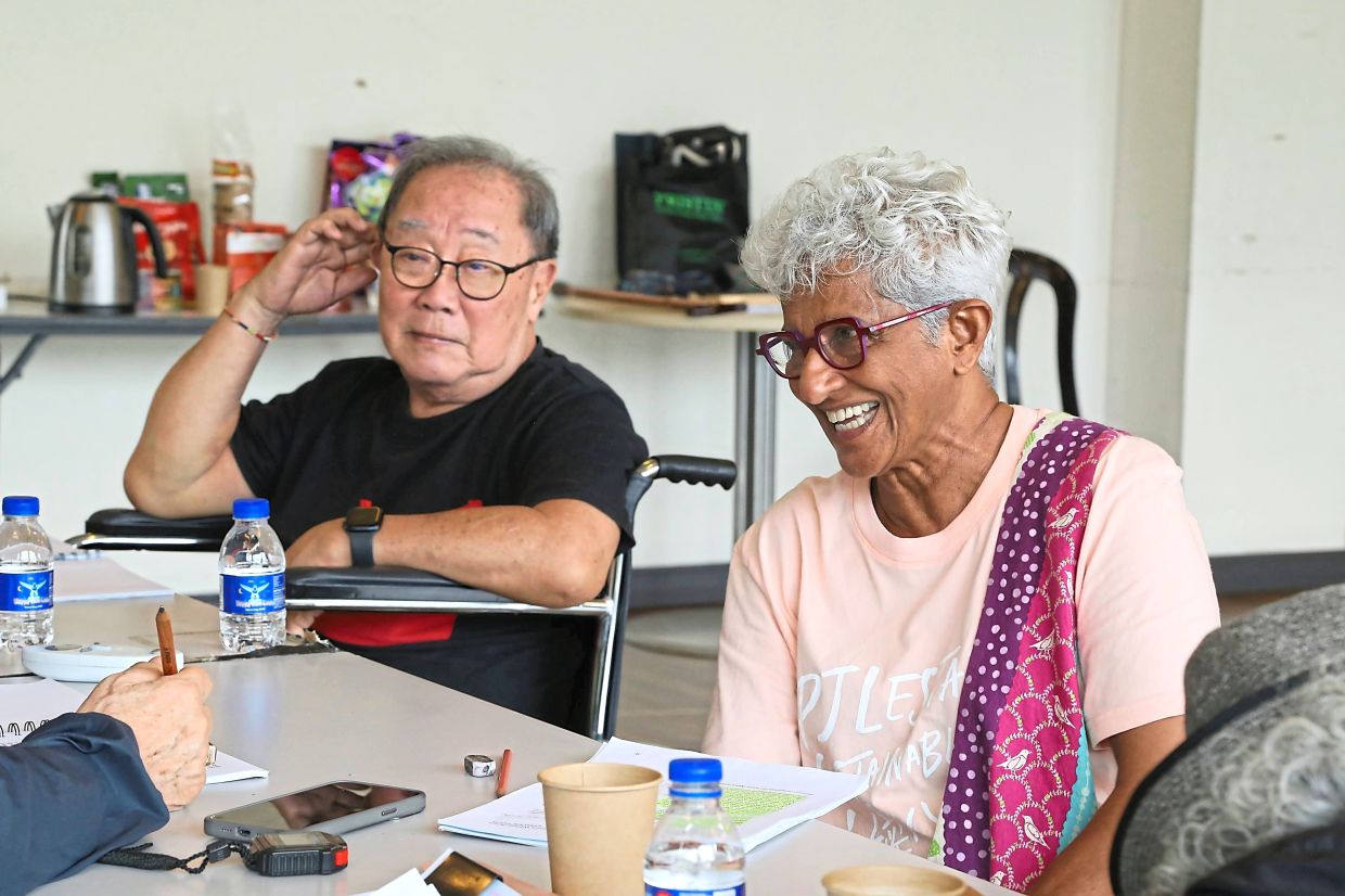 Teoh (left) and James share a candid moment during rehearsals for a play exploring themes close to home. Photo: KLPac