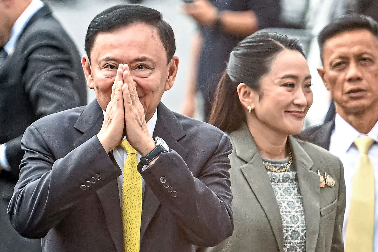 Jailed former Thai PM Thaksin may be eligible for parole in May