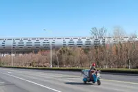 Economy weathers tariffs to hit 5% growth