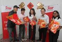 Business partners make festive visit to SMG Penang office