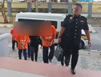 Four, including three civil servants, remanded five days in probe into RM580,000 in bribes