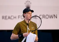 Tennis-Sinner through to Australian Open second round after Gaston retires