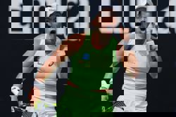 Tennis Grand Slam - Tjen first Indonesian to win at Australian Open in 28 years