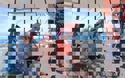 Philippine coast guard rescues one and searches for 12 missing after motorboat vanishes