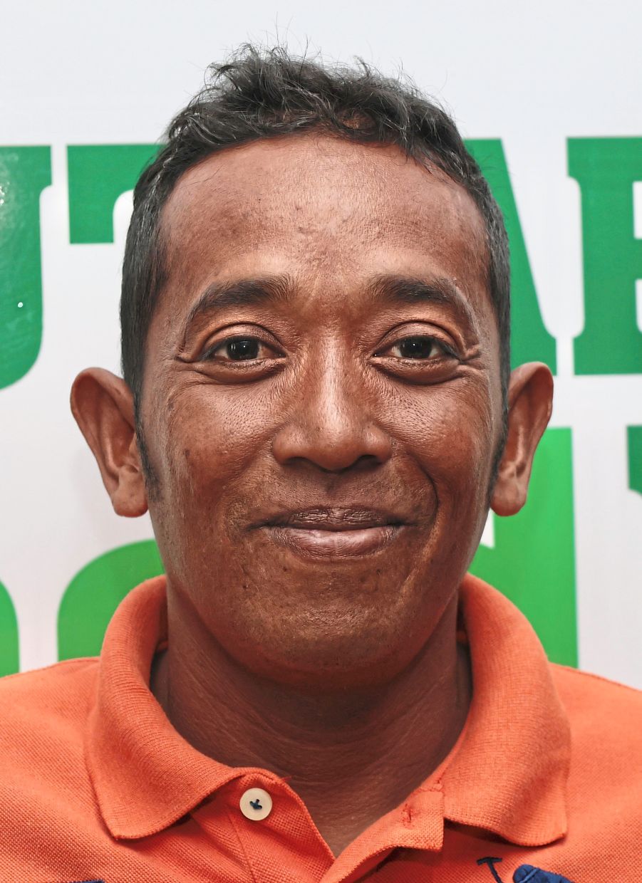 Romle receives rations from the Mutiara Food Bank every month.