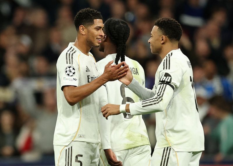 Soccer-Mbappe and Vinicius shine as Real Madrid thrash Monaco 6-1