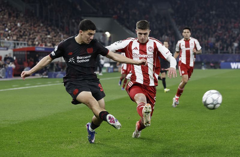 Soccer-Olympiacos power past Leverkusen 2-0 to keep alive qualifying hopes