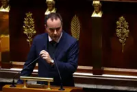 French PM forces part of budget bill through lower house without vote
