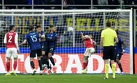 Soccer-Arsenal in seventh heaven with 3-1 win at Inter