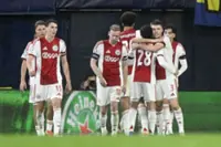 Soccer-Last gasp goal keeps alive Ajax’s Champions League hopes
