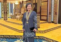 Sharon hopes to inspire more women to be sports leaders after making history