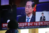 S. Korea court sentences ex-PM Han to 23-year jail term in case related to martial law (update)