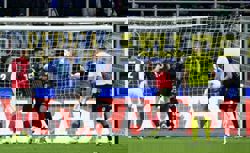 Soccer-Arsenal in seventh heaven with 3-1 win at Inter