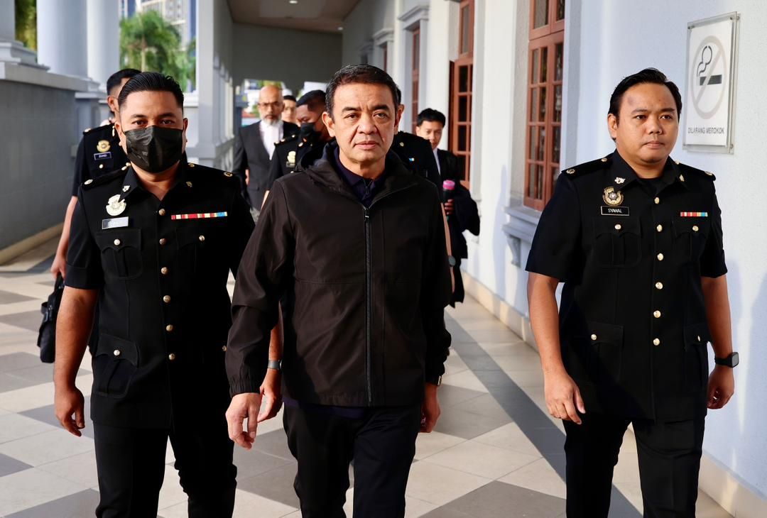 Former Army Chief, Tan Sri Hafizuddeain Jantan, arrived at the Kuala Lumpur Court Complex at 8:10 AM, accompanied by MACC officers. — RAJA FAISAL HISHAN/The Star