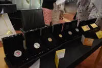 Limited-edition commemorative coins, gold foil for Brunei Ruler's Diamond Jubilee Wedding Anniversary