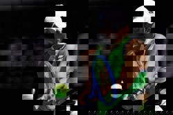 Tennis-Defending champion Keys survives mid-set wobble to advance