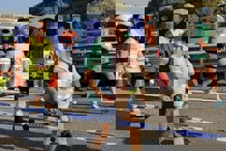 Hong Kong marathon runner with baby investigated for child abuse