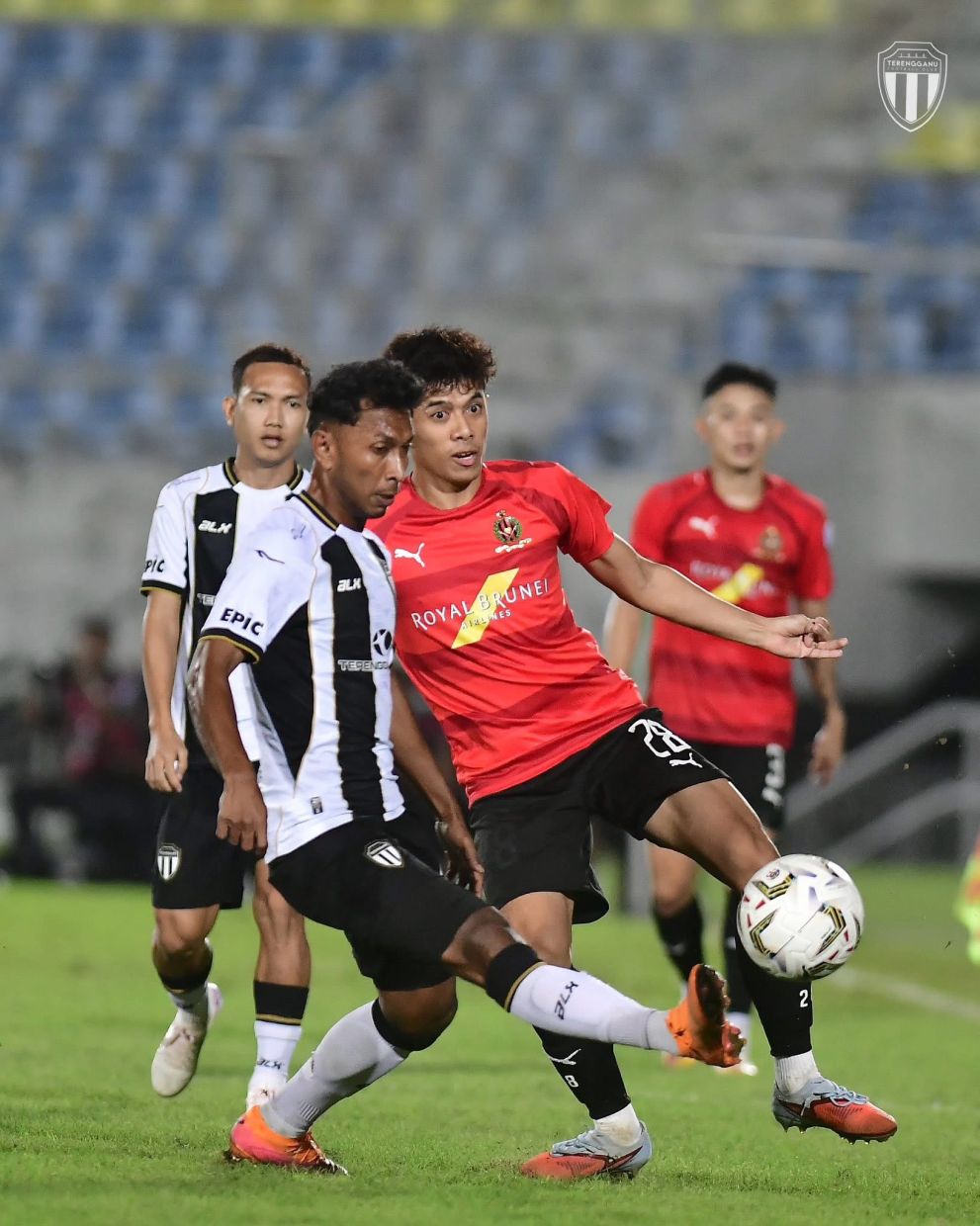 Staying wary: Terengganu’s Akram Mahinan (front) will be cautious in the second-leg match against UM-Damansara. — Terengganu FC