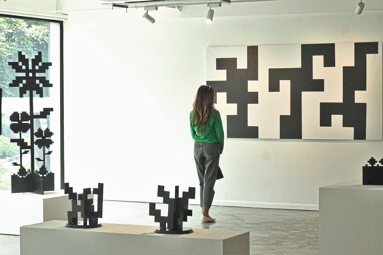 In 'Matematika', Faizal Sidik’s use of grids, lines, and geometric forms creates open systems that invite reflection on order, chance and continuity. Photo: The Star/M. Irsyad 