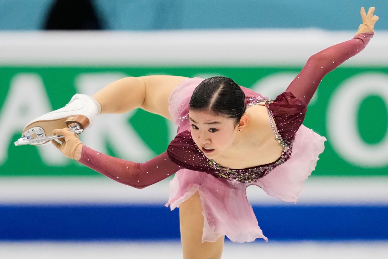 Mone Chiba of Japan competes in the Women's Free Skating of the ISU Four Continents Figure Skating Championships in Beijing, China, on Friday, Jan 23, 2026. - AP Photo/Vincent Thian