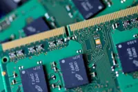 Surging memory chip prices dim outlook for consumer electronics makers