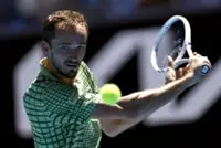Tennis-Medvedev fights back from two sets down to beat Marozsan at Australian Open